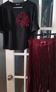 black shirt w/ velvet applique and metallic skirt